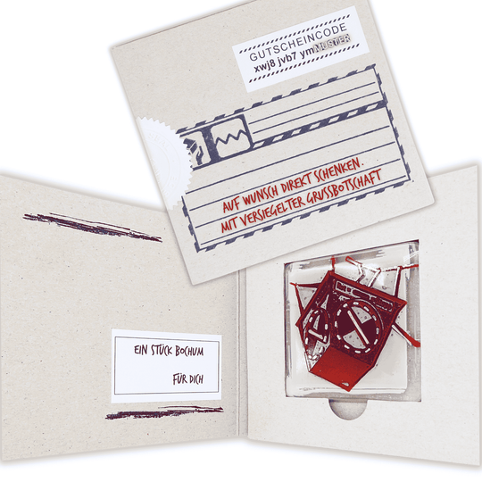 Edition 0/12. Offene und versiegelte Pott Glas Gutschein-Verpackung mit der Aufschrift „Auf Wunsch direkt schenken. Mit versiegelter Grußbotschaft.“ Gezeigt wird das rote Heuer-Ampel-Motiv als Muster.