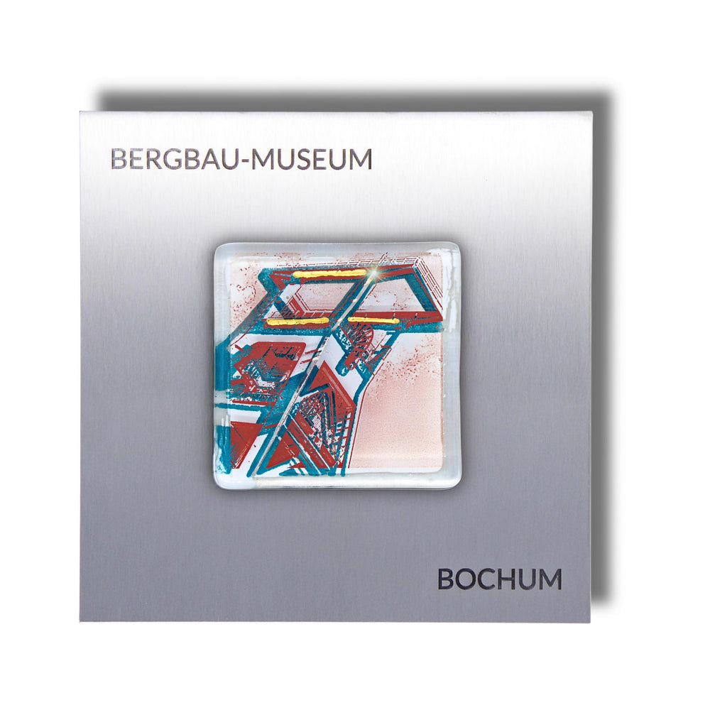 Edition 1/12. Pott Glas Wand-Potträt mit Förderturm-Motiv in Grün. Foto in Schmelzglas auf Edelstahl. Quadratisches Format mit Gravur „Bergbau-Museum Bochum“.