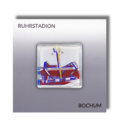 Edition 10/12. Pott Glas Wand-Potträt mit Ruhrstadion-Motiv in Blau. Foto in Schmelzglas auf Edelstahl. Quadratisches Format mit Gravur „Ruhrstadion Bochum“.