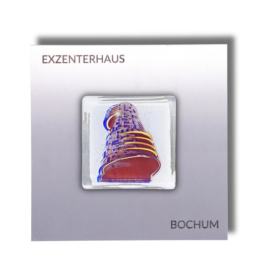 Edition 2/12. Pott Glas Wand-Potträt mit Exzenterhaus-Motiv in Blau. Foto in Schmelzglas auf Edelstahl. Quadratisches Format mit Gravur „Exzenterhaus Bochum".