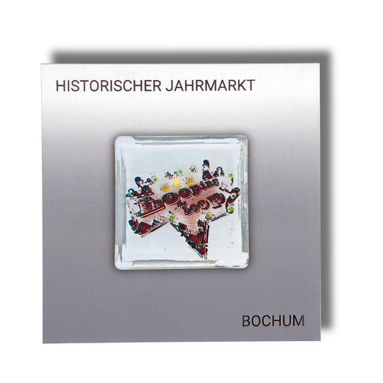 Edition 3/12. Pott Glas Wand-Potträt mit "Looping the Loop"-Motiv in Grün, mit Gold Akzenten. Foto in Schmelzglas auf Edelstahl. Quadratisches Format mit Gravur „Historischer Jahrmarkt Bochum“.