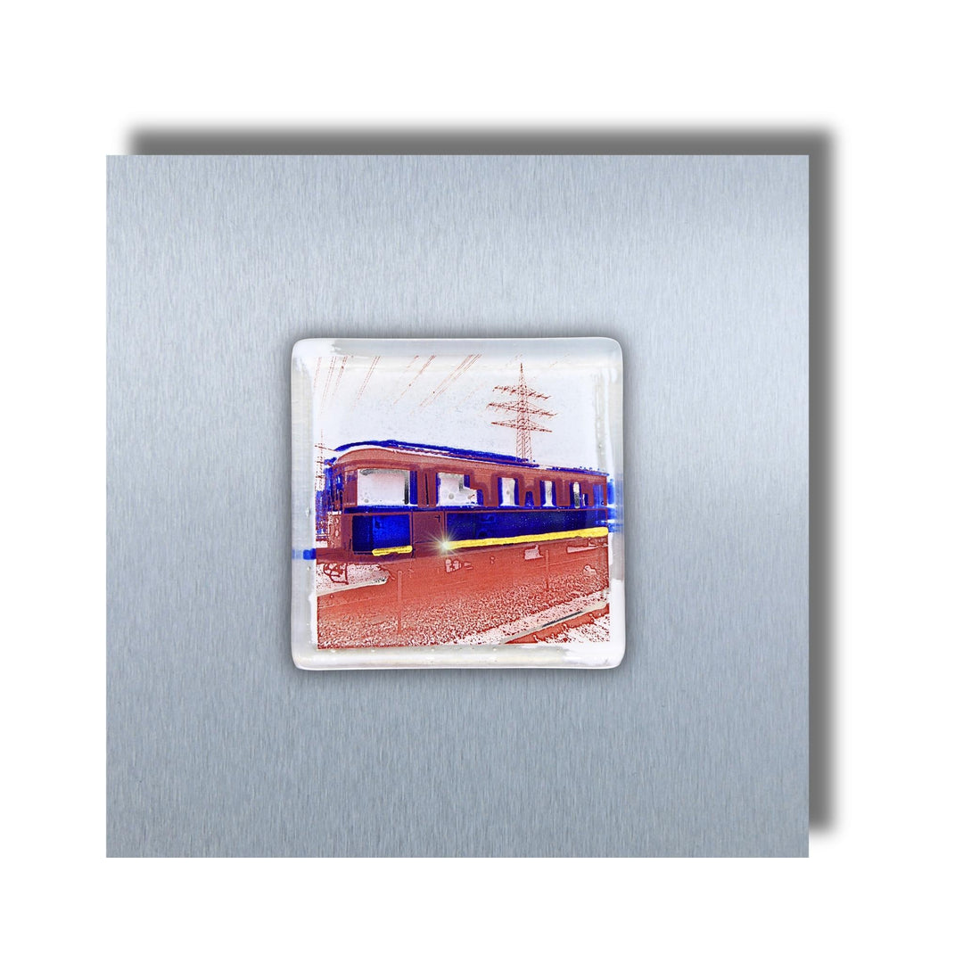Edition 5/12. Pott Glas Wand-Potträt mit Railflex-Motiv in Blau. Foto in Schmelzglas auf Edelstahl. Quadratisches Format ohne Gravur.
