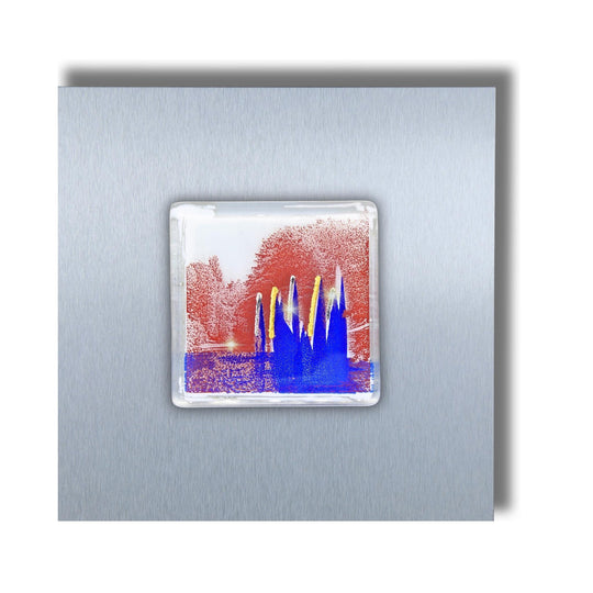Edition 8/12. Pott Glas Wand-Potträt mit Stadtpark Fontäne-Motiv in Blau. Foto in Schmelzglas auf Edelstahl. Quadratisches Format ohne Gravur.